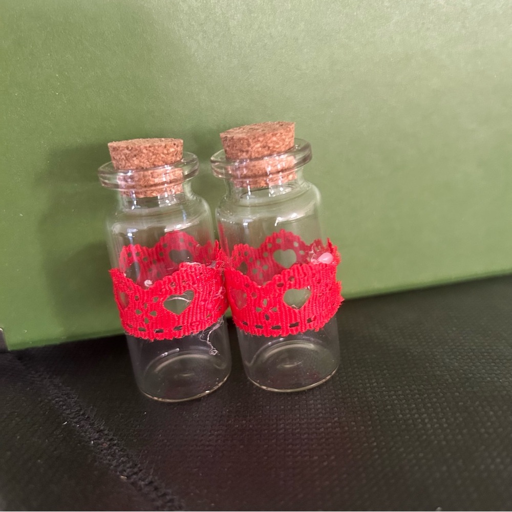 Free item: two small bottles with corks